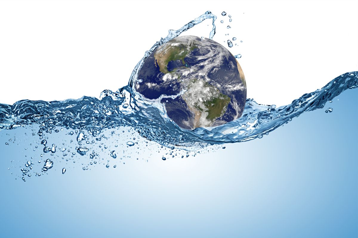 planet earth globe in wave of water in the ocean. Climate change